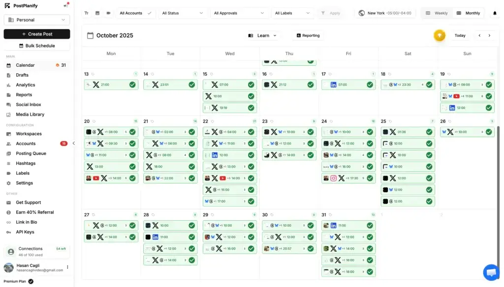 PostPlanify dashboard showing a monthly social media calendar with scheduled posts across multiple connected accounts.