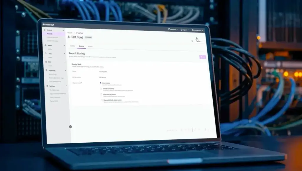 Passpack record sharing screen displayed on a laptop in a server room