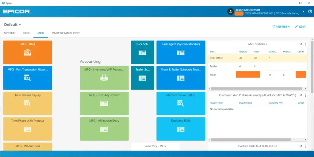 Epicor Kinetic manufacturing dashboard showing MRP statistics, BOM tools, inventory reconciliation, and production menu tiles