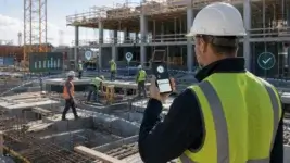 Construction supervisor using a mobile time tracking app with GPS markers and a geofence around an active jobsite